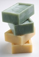 stack of four pills natural soap
