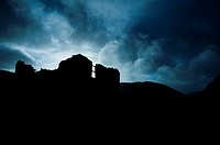 The broken shell of an abandoned and ruined house, in a remote valley in Gwynedd, Wales UK. December 17 2015.
