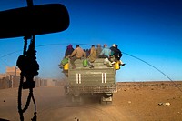 Niger, Agadez, truck of emigrants leaving the town and crossing the desert