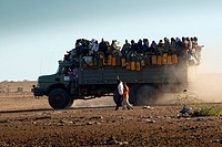 Niger, Agadez, truck of emigrants leaving the town and crossing the desert