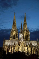 Facade of Cologne Cathedral, Germany Illuminated at Night.