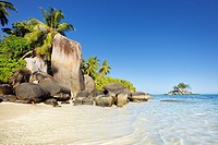 Anse Royale with palm trees and sculpted rocks, Mahe Island, Seychelles, Indian Ocean, Africa.
