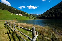 Durnholz or Valdurna, overlooking the lawns and the lake around the country, Sarentino, Sarntal valley, Trentino-Alto Adige (Südtirol), Italy