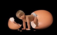Little Girl emerging from Egg against Black Background.