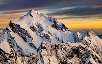 Mt Tutoko (2,723 m) at dawn, highest peak in Darran Mountains, aerial view over Hollyford Valley, Fiordland National Park, New Zealand.