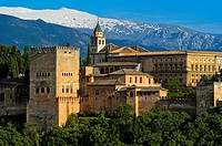 Alhambra, UNESCO World Heritage Site, against Sierra Nevada mountain range, Granada, Andalusia, Spain.