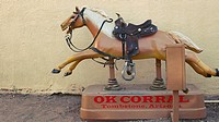 Coin-operated horse ride runs at the OK Corral in Tombstone, Arizona.