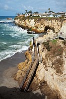 Clifftop houses, staircase to beach, Avila Beach State Park and town of Avila Beach, San Luis Obispo County, CA, USA.