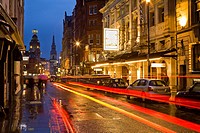 London, England, St. Martin´s Lane at dusk, Noel Coward Theatre, Duke of York´s Theatre, Coliseum, Church of St. Martin-in-the-Fields, pubs and restau...