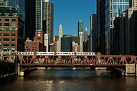 L train on Wells Street Bridge over Chicago River in Chicago, Illinois, USA.