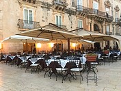 Restaurant in front of the Venezian buildings at the Duomo square, Syracuse, Sicily, Italy, Europe