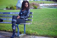 portrait of a cool African Canadian girl posing along the seawall in Vancouver Canada.