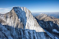 Aerial view of the north face of Piz Badile located between Masino and Bregaglia Valley border Italy Switzerland Europe.