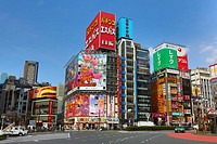 Buildings and advertising signs in Shinjuku in Tokyo, Japan.