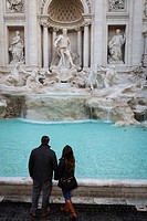 Couple at the Trevi fountain. Rome, Italy.
