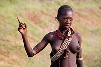 Portrait of a Young topless teen member of the Bena Tribe, Omo Valley, Ethiopia.