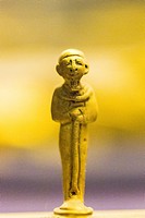 Egypt, Cairo, Egyptian Museum, gold statuette of the god Ptah holding a scepter. From Tanis.