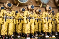 Diver Figurines Lined Up on a Shelf, Tarpon Springs, Florida.