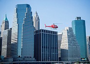 A sightseeing helicopter departs the Downtown Heliport in New York