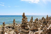A large collection of rock totems, cairns, lining Lake Michigan´s shoreline at Cave Point County Park, Sturgeon Bay, Door County, Wisconsin, USA.