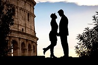 Couple silhouette. Roman Colosseum. Rome, Italy.