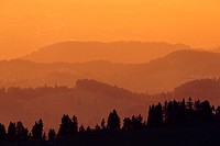 mountain chains at sunset, view from Niederhorn, Bernese Oberland, Switzerland.