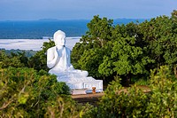 Giant Seated Buddha at Mihintale Monastery, Anuradhapura District, North Central Province, Sri Lanka, Asia.