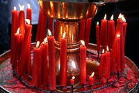 Red candles burning at the Longshan Buddhist Temple at Chinese New Year in Taipei, Taiwan.