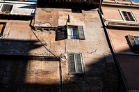 Detail of a building in Via del Portico di Ottavia, Rome, Italy