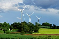 Wind turbines in the countryside (North Mayenne, Pays de la Loire, France). .