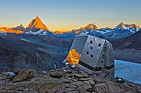Dawn at the Monte Rosa Hut, Monte Rosa Hütte, above the glacier Gornergletscher, first sun rays at the top of the Matterhorn peak, Zermatt, Valais, Sw...