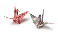 Two origami paper crane birds on white background.