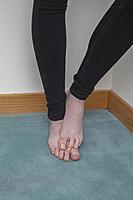 Teenage girl's legs and bare feet.