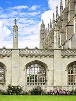 Stone arch windows of King's College Cambridge on King's Parage, Cambridge, England, UK.