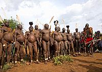 Bodi tribe fat men during Kael ceremony, Omo valley, Hana Mursi, Ethiopia.