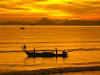 Longtail boat silohuette - Krabi, Thailand.