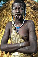 Teenage girl belonging to the Mursi tribe ( Omo valley, Ethiopia).