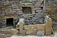 Skara Brae Stone Age Neolithic village at Skaill, Orkney, Scotland. Interior detail of stone box bed and alcoves in House 1. 3100 BC.