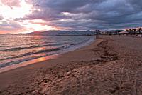Sunset from sandy beach in Mallorca, Balearic islands, Spain in September.