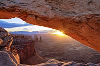 If you visit Utah's Canyonlands National Park, you must see Mesa Arch at sunrise. The rising sun reflecting off the canyon wall below gives the arch t...