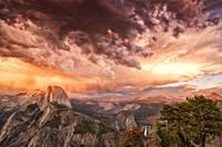 Dramatic Cloud Formation and thunderstorm over Half Dome at sunset.