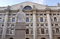 Milan, Italy: L.O.V.E. (´The Finger´) sculpture by Maurizio Cattelan, facing Palazzo Mezzanotte (Stock Exchange Building) in Piazza degli Affari