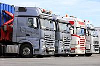 Fleet of UK trucks, two Mercedes-Benz Actros in the front, of G&S Transport, parked on Finnish truck stop yard. Hirvaskangas, Finland - June 15, 2018.
