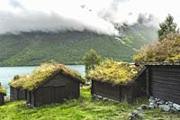 mountain pasture Breng and lake Lovatnet, Loen, Norway, alpine log huts in the Jostedalen.