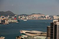 Hong Kong, China - September 25, 2009: Wide view high rise towers, modern buildings and vessels on the sea in Hong Kong.