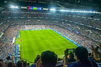 Spectators during Real Madrid-Atletico de Madrid football match. Santiago Bernabeu stadium, Madrid, Spain.