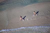 Children in the beach. Aerial view of the South Coast of the island of mallorca, Balearic Island, Spain. .