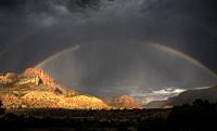 A rainbow appears during a monsoonal thunderstorm at Zion National Park, Utah.