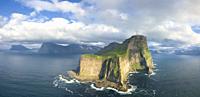 Aerial panoramic of Kallur lighthouse and cliffs, Kalsoy island, Faroe Islands, Denmark.