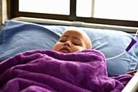 World Cancer Day. Guwahati, Assam, India. 4 February 2019. A Child Cancer patient on a bed at Dr. Bhubaneswar Borooah Cancer Institute and research ce...